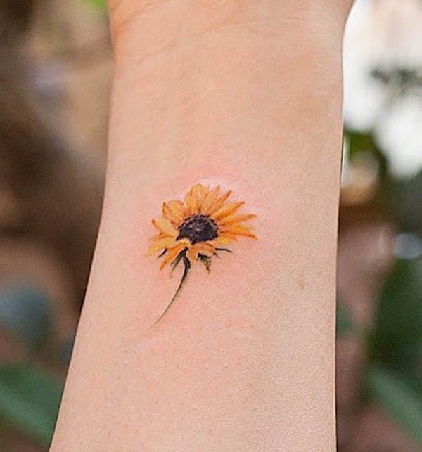 Cheerful sunflower tattoos with meaning