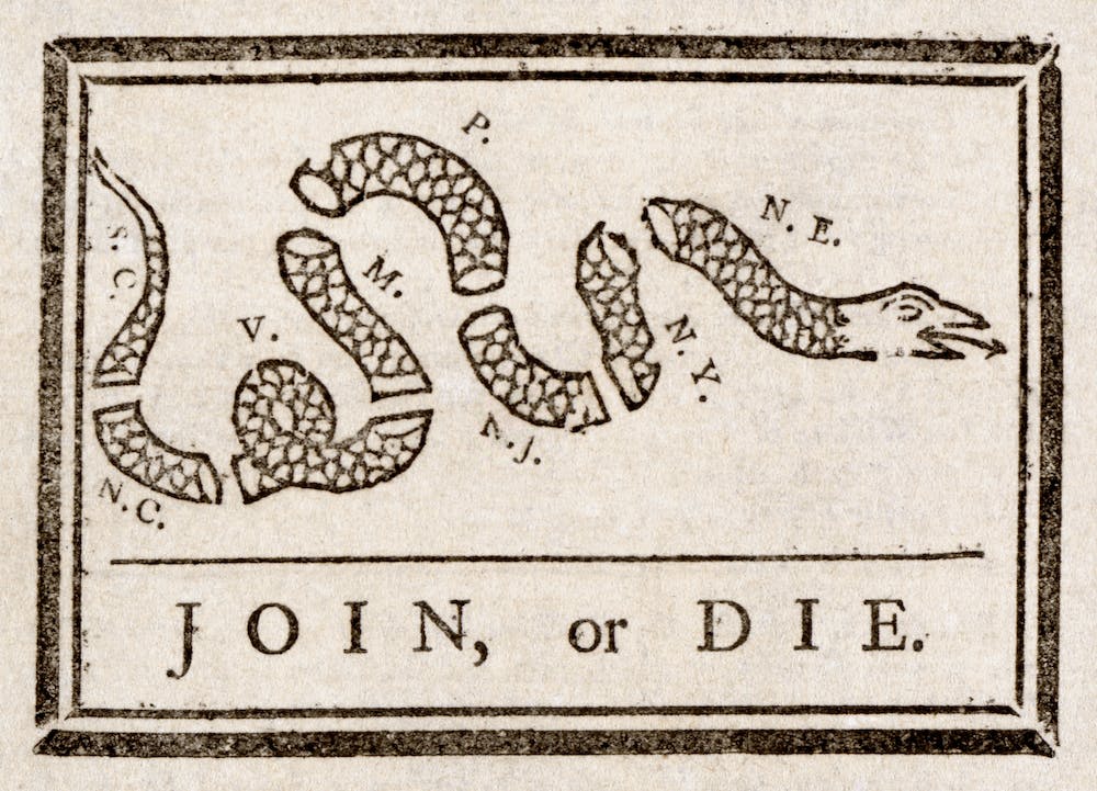 Yellow gadsden flag prominent in capitol takeover carries a long and shifting history