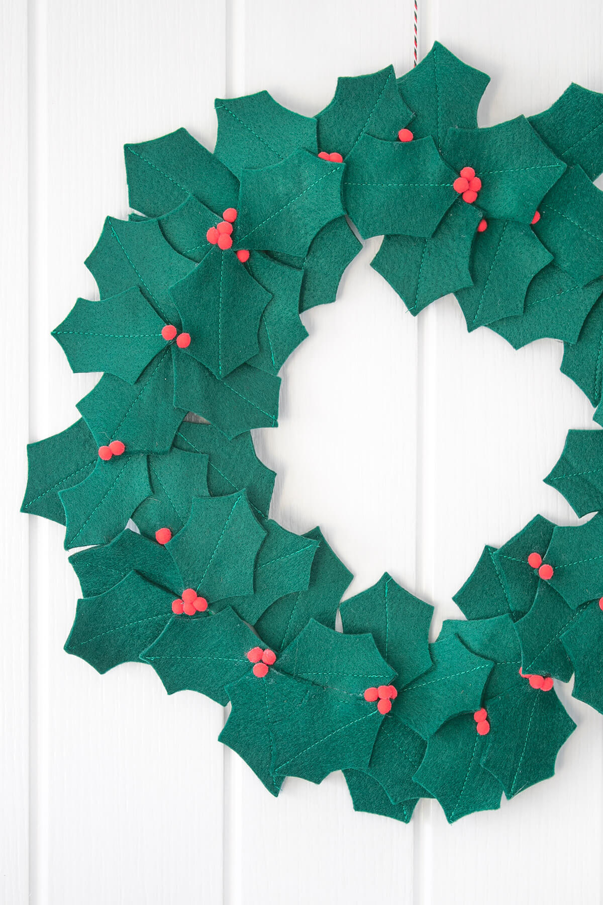 Make a diy felt holly wreath