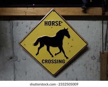 Horse crossing sign photos and images