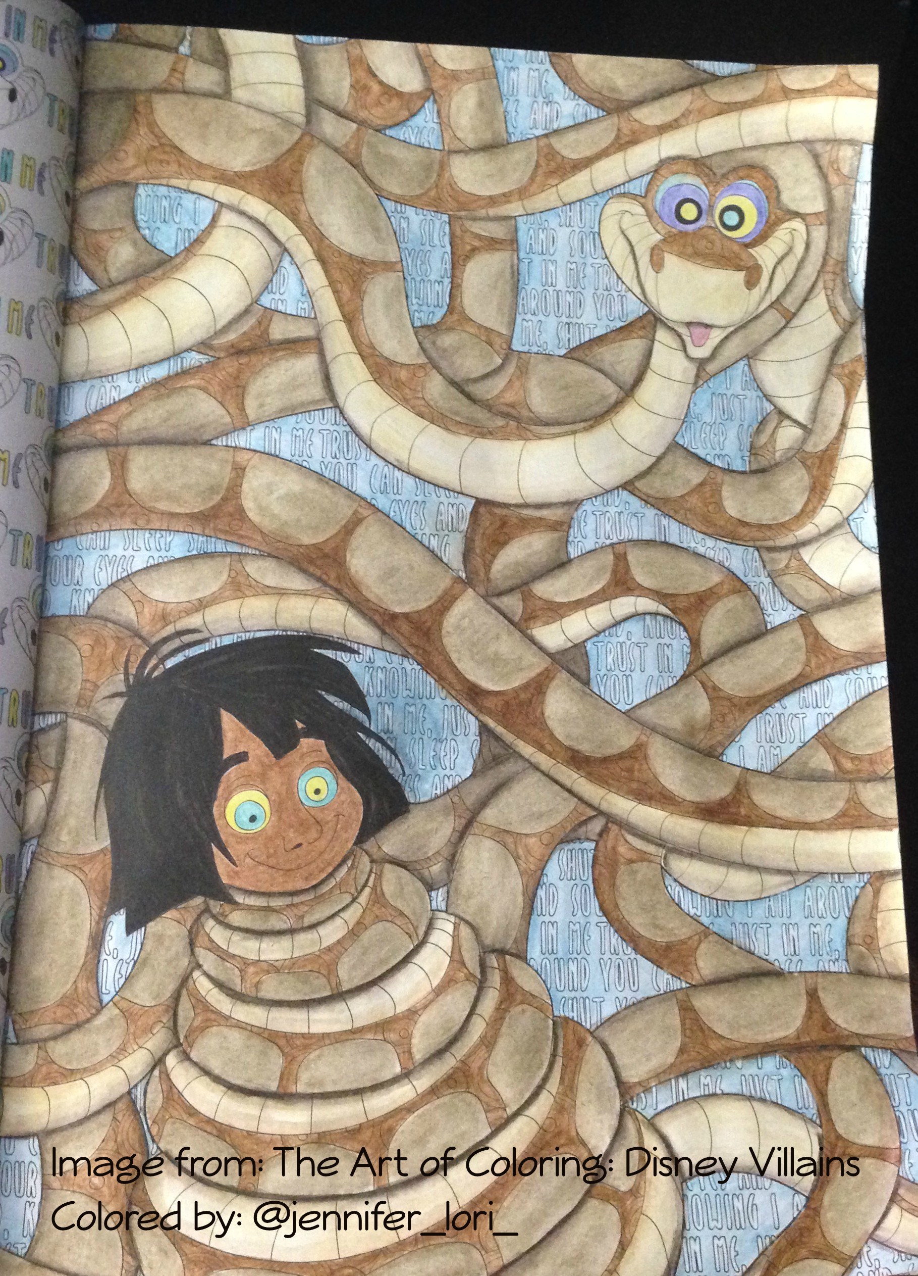 Coloring mowgli and kaa in the art of coloring disney villains with derwent inktense pencils