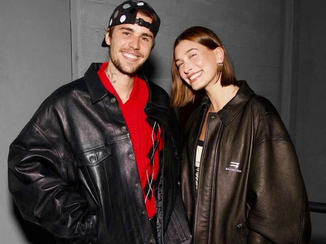 See hailey and justin bieber match in oversize leather jackets for concert date