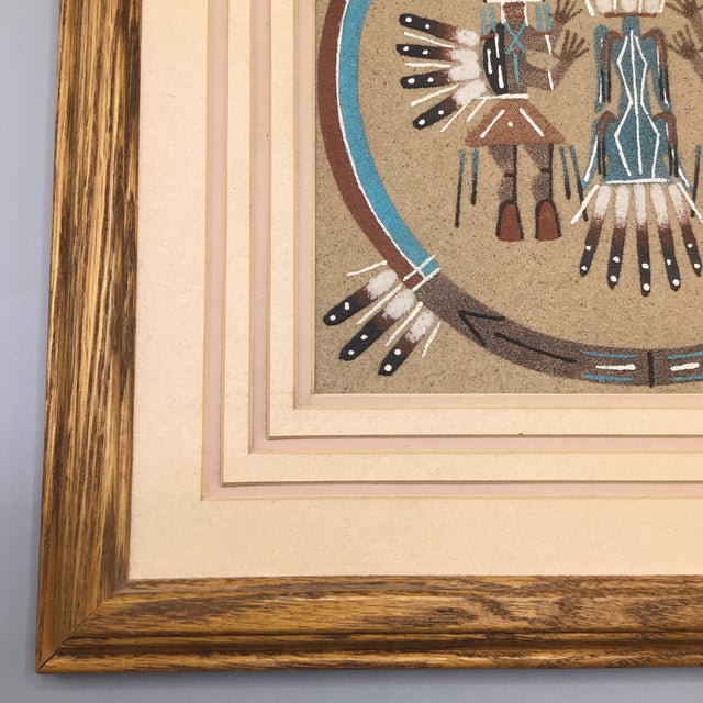 Vintage framed navajo sun sand painting with camel and rainbow people