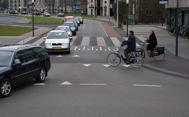 Places where cars bikes and pedestrians all share the road as equals
