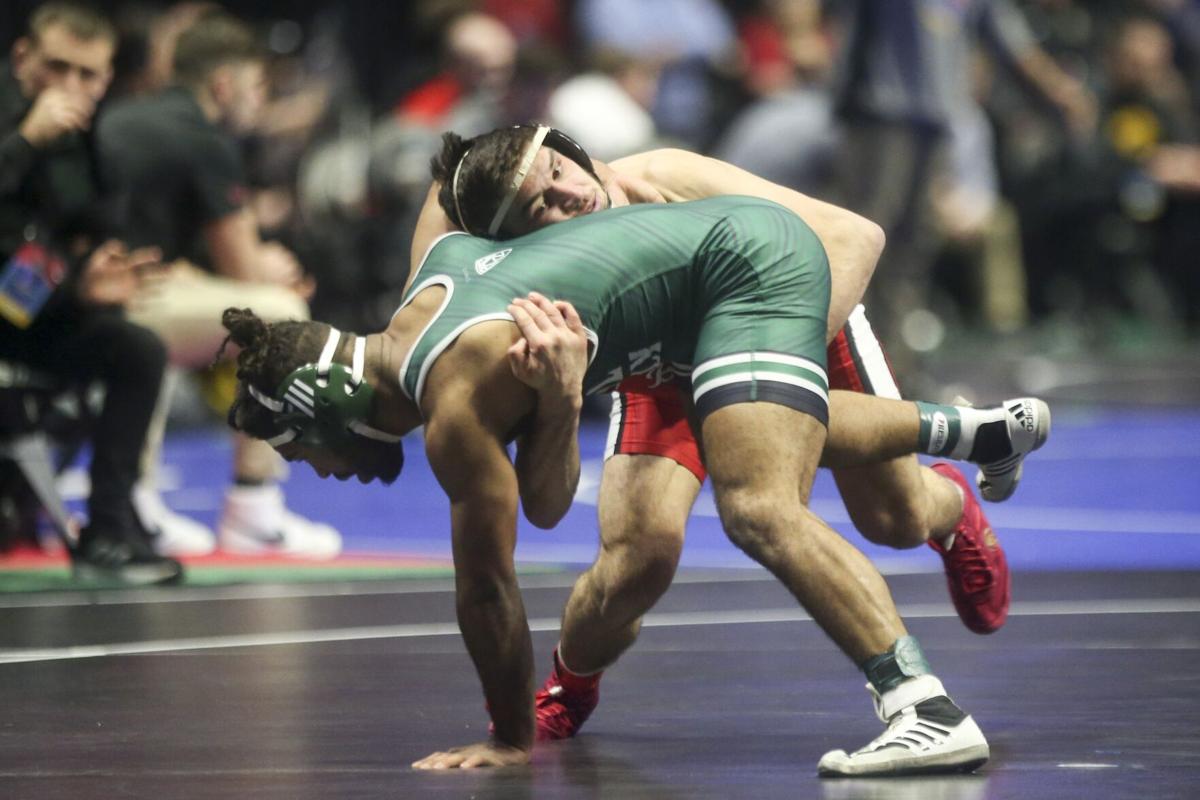 Bill haisten for two ncaa wrestlers pressure to match pat smiths achievement of