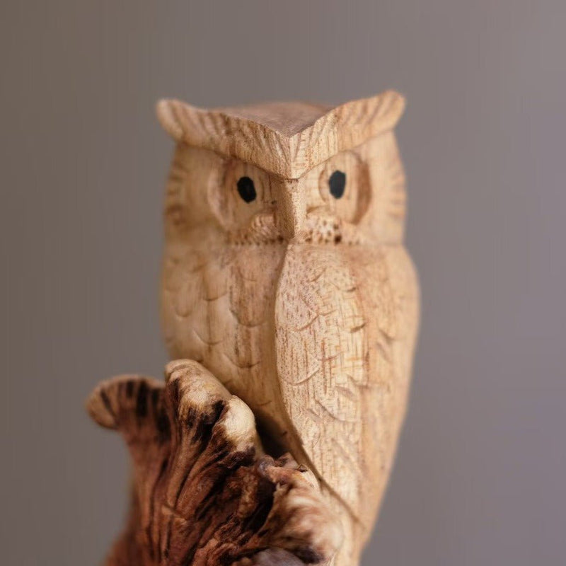 Wooden tree owl sculpture â