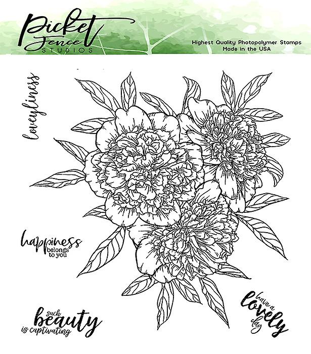A ruffled peony bouquet with picket fence studios