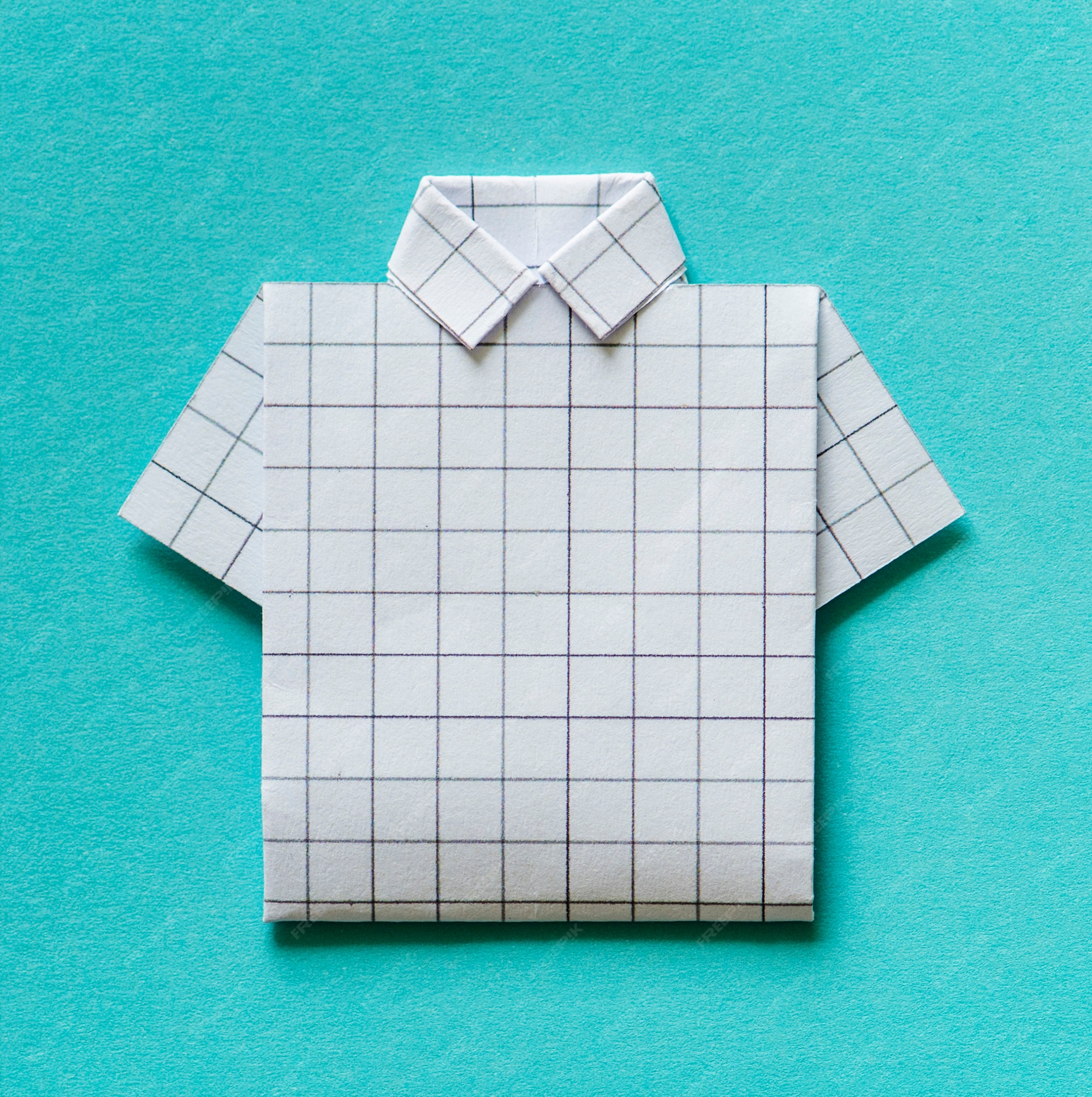 Free photo folded shirt origami paper craft