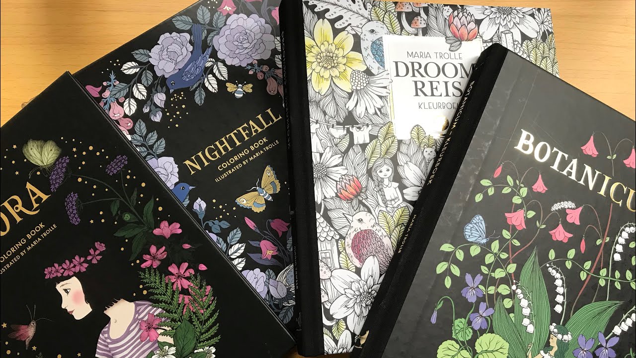 Copleted pages in y aria trolle colouring books adult colouring
