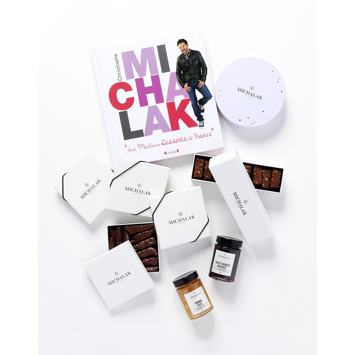 A signed book and a gourmet basket from christophe michaâ