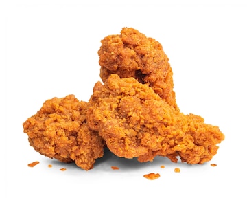 Piernas de pollo frito aisladas en el fondo blanco foto premium