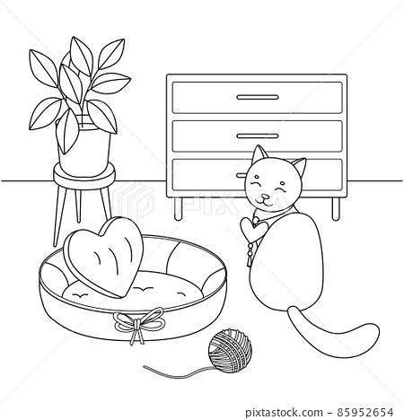 Cute cat sitting next to his pillow room
