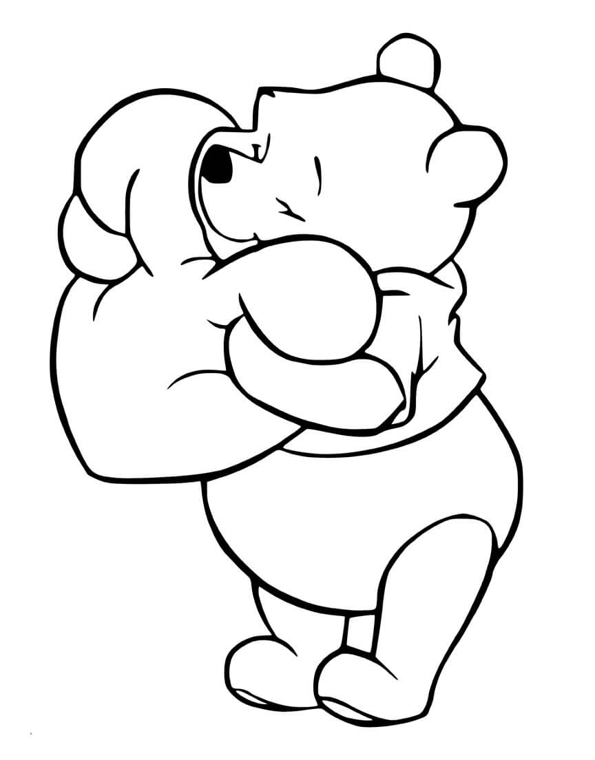 Pooh bear with heart in valentine coloring page