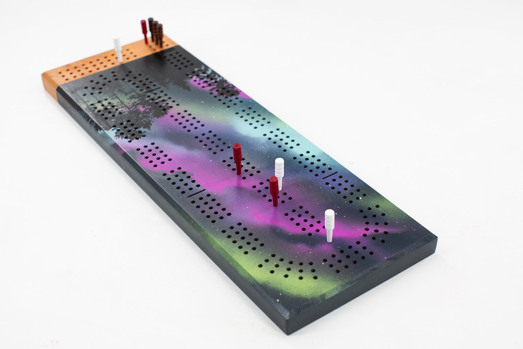 Aurora borealis painted cribbage board