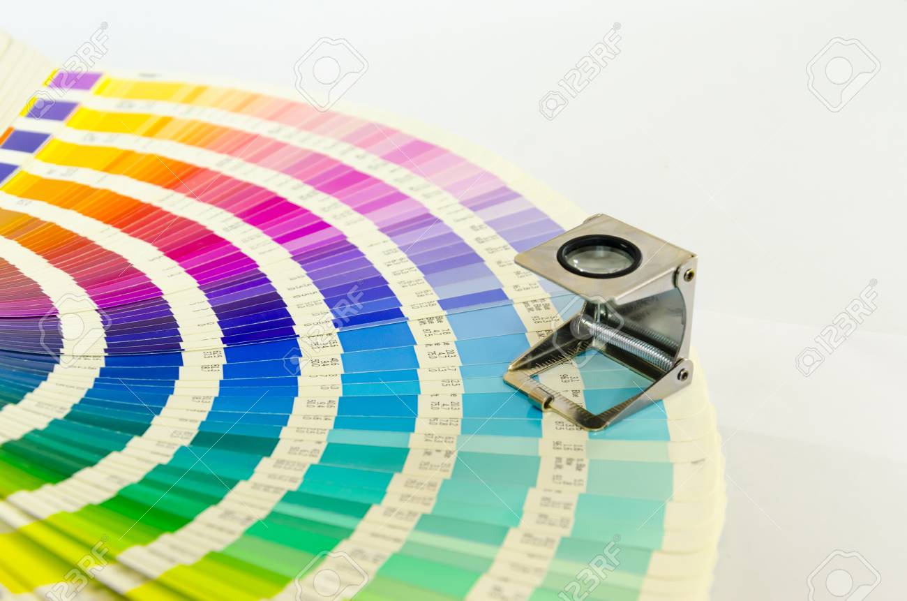 The magnifying glass standing on a color palette print stock photo picture and royalty free image image