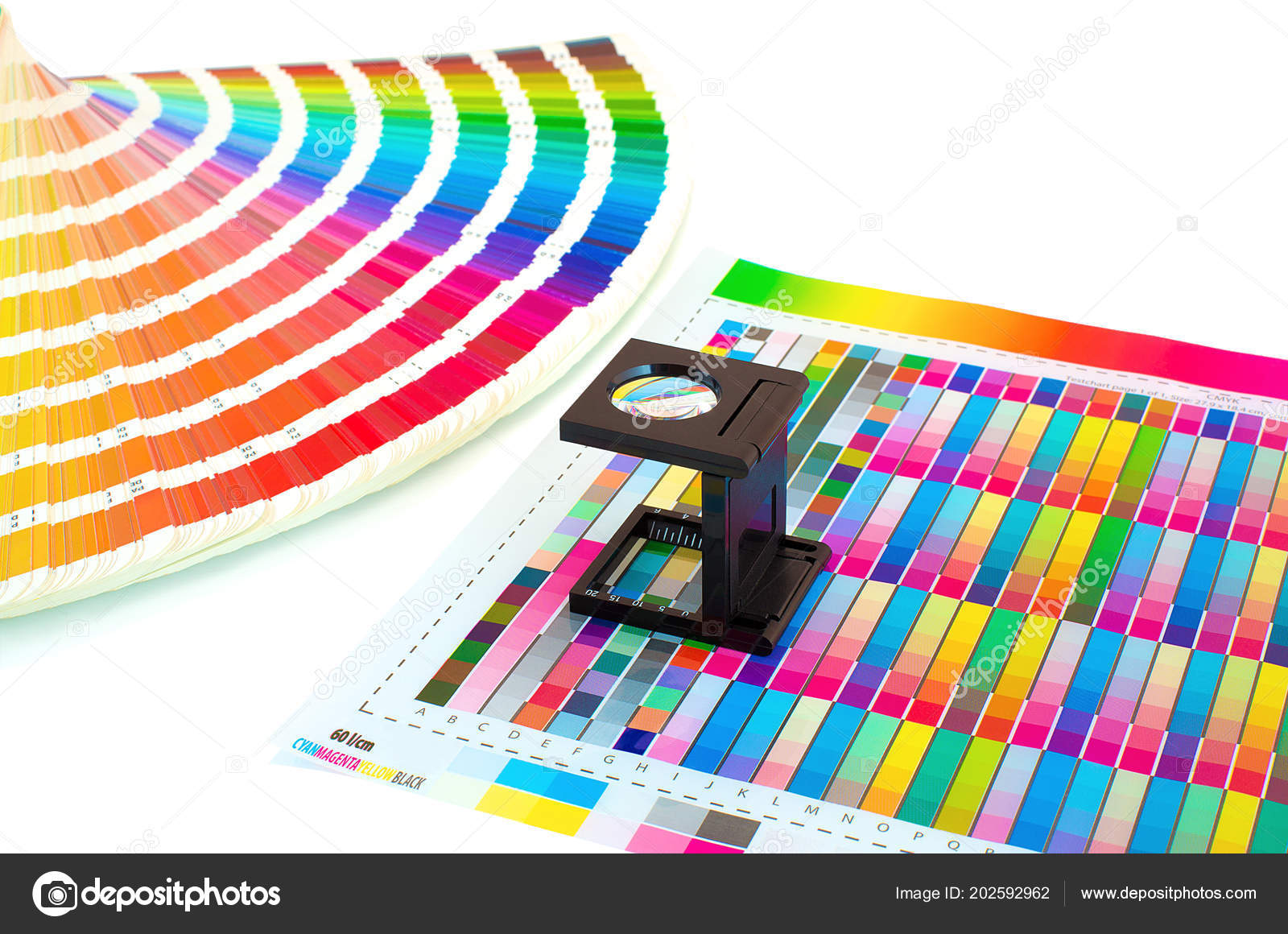 Magnifying glass printed color swatch isolated white color management printing stock photo by boitano