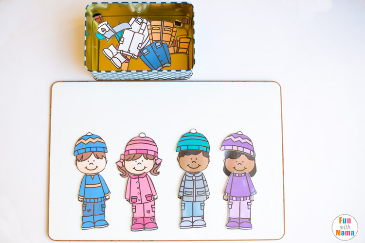 Printable winter paper dolls dress up busy bag