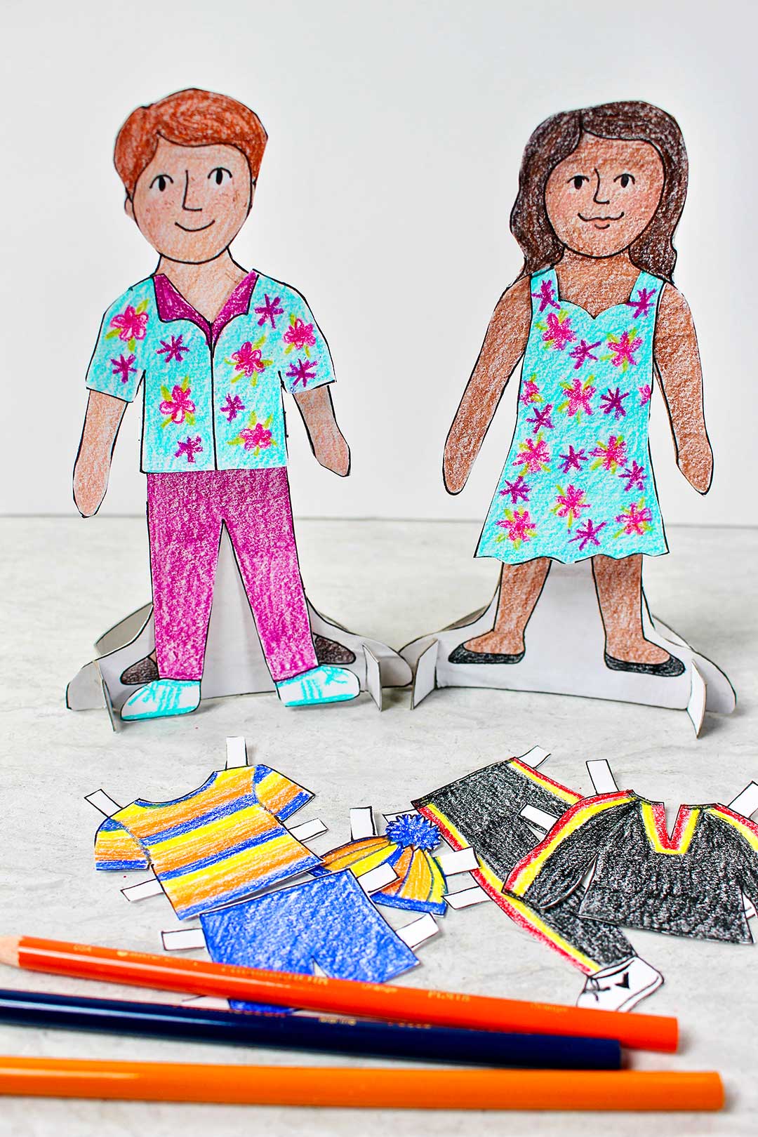 Free printable paper dolls and clothes to color