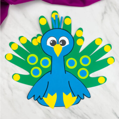 Cute peacock handprint craft free template