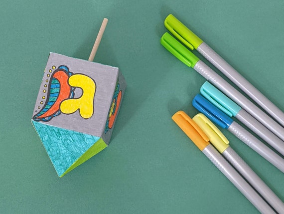 Paper dreidel for chanukah hanukkah craft template and coloring page for big kids and adults printable pdf and png favor boxes