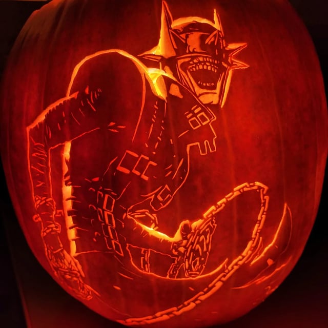 Artwork the batman who laughs carved into a pumpkin rdcics