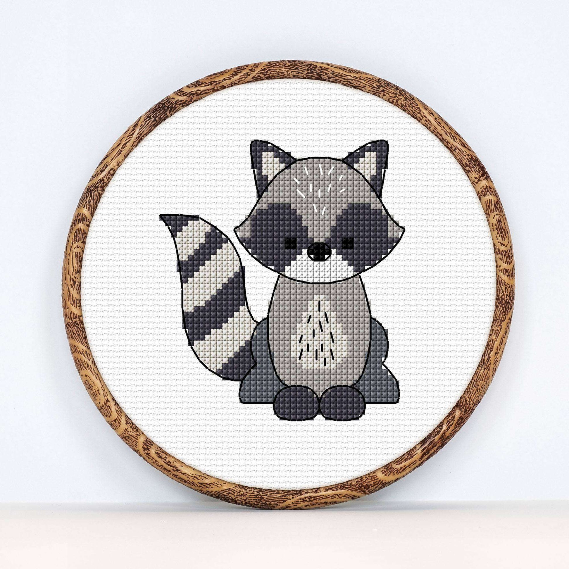 Anchor raccoon cross stitch design pattern