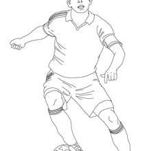 Soccer player dribbling coloring pages