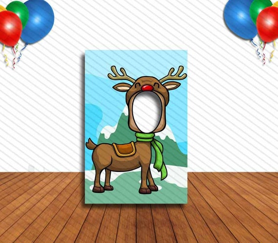 Rudolph the red nose reindeer face cutout hole in face party selfie photo prop christmas decoration