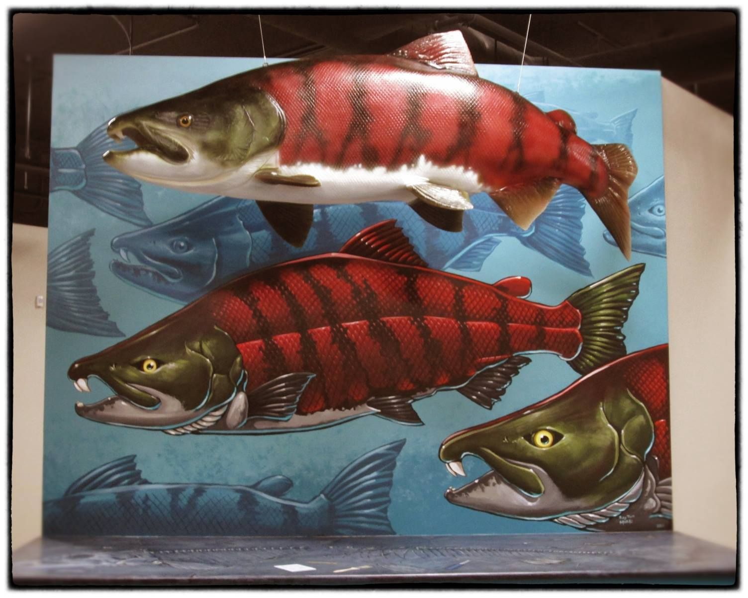 Ray troll hours ago the recent saber toothed salmon mural i did with memo jauregui at the university of oregons muâ sabertooth illustration design fish pet
