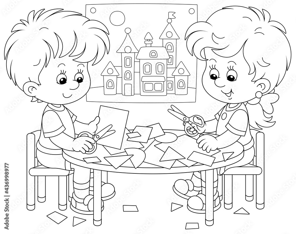 Happy little children cutting outlines and figures from paper with scissors and making a funny picture