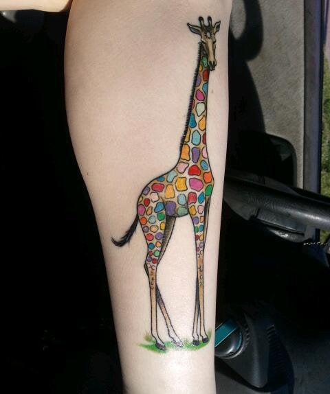 This is my rainbow giraffe tattoo done by the fantastic bryan mozjesik at big brain in omaha ne three and a half hours of severe pain but so worth it rtattoos