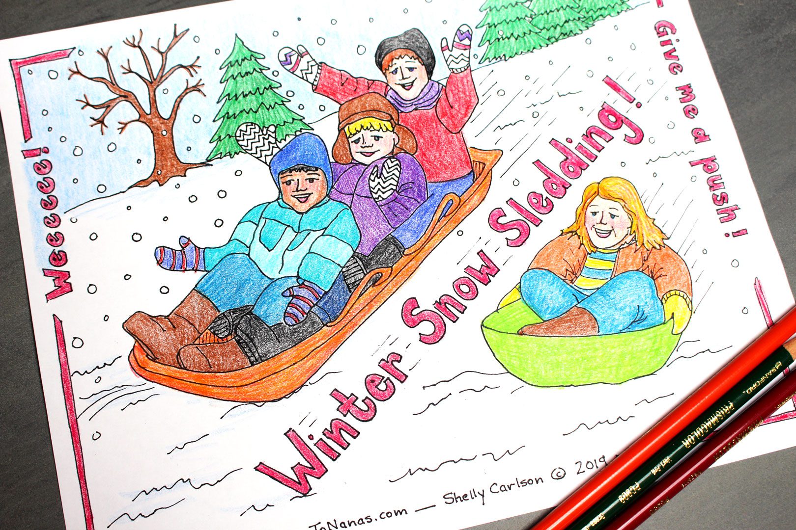 Winter snow sledding coloring page