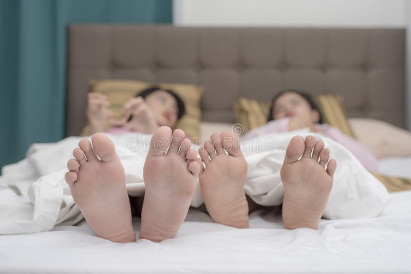 Sleepover feet stock photos