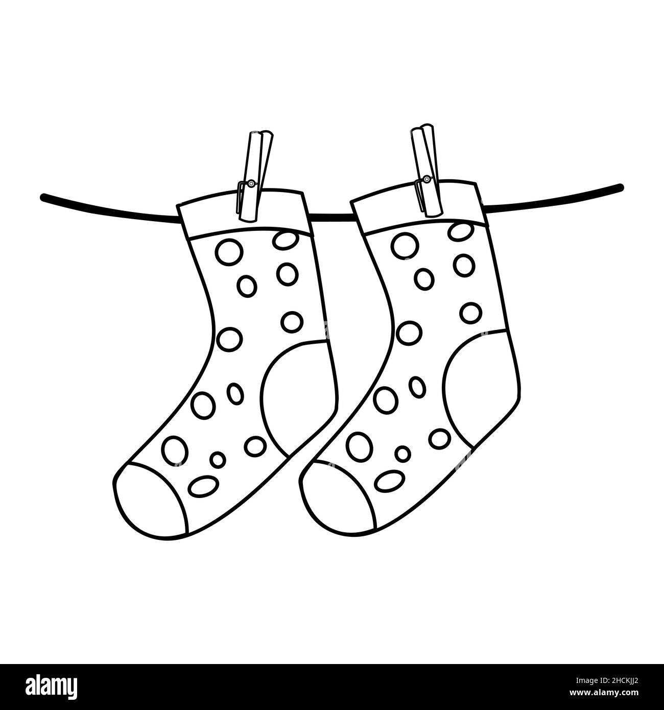 Pair of socks drying on the cloth line cut out stock images pictures