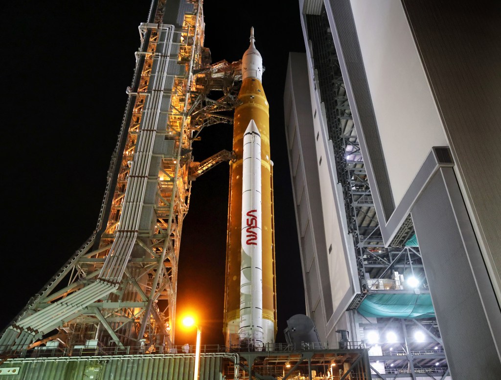 Artemis i rocket takes last road trip despite lightning