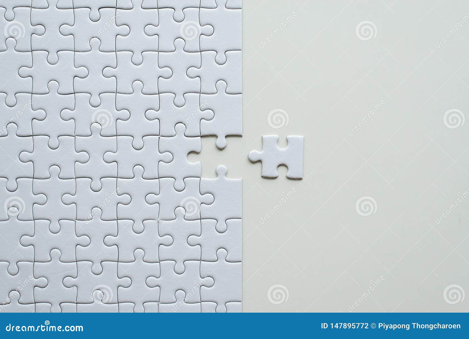 Picture of jigsaw puzzle white colorpuzzle pieces gridmosaic solution templatetop viewcopy space for text stock photo