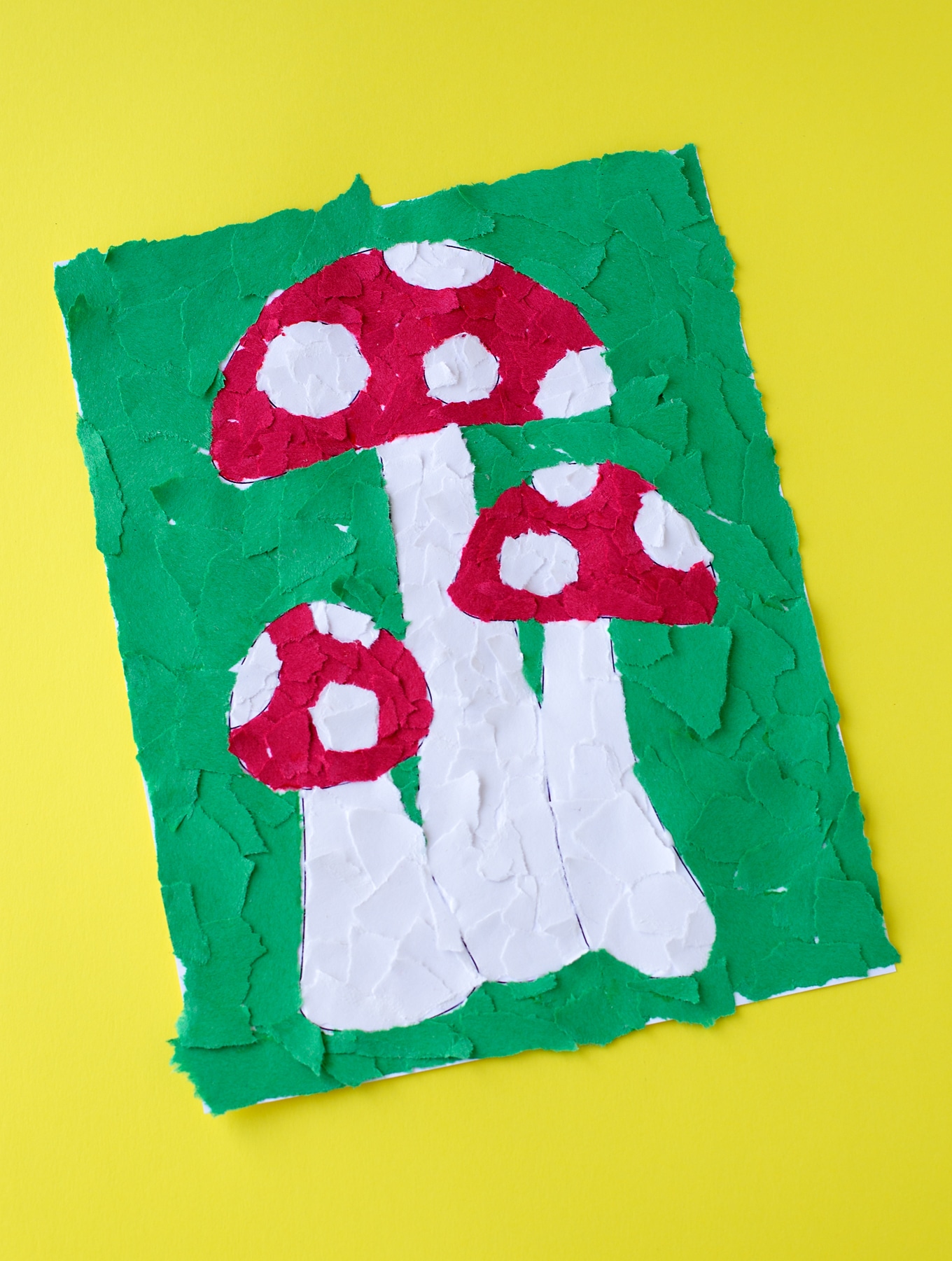 Torn construction paper mosaic mushroom art