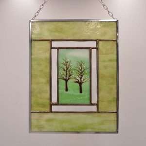 Pine tree with snow panel hanging