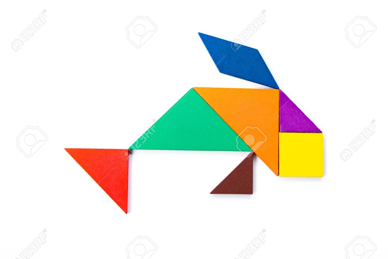 Color wood tangram puzzle in carp fish shape on white background stock photo picture and royalty free image image
