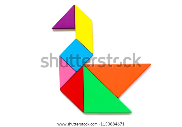 Color wood tangram puzzle swan shape stock photo