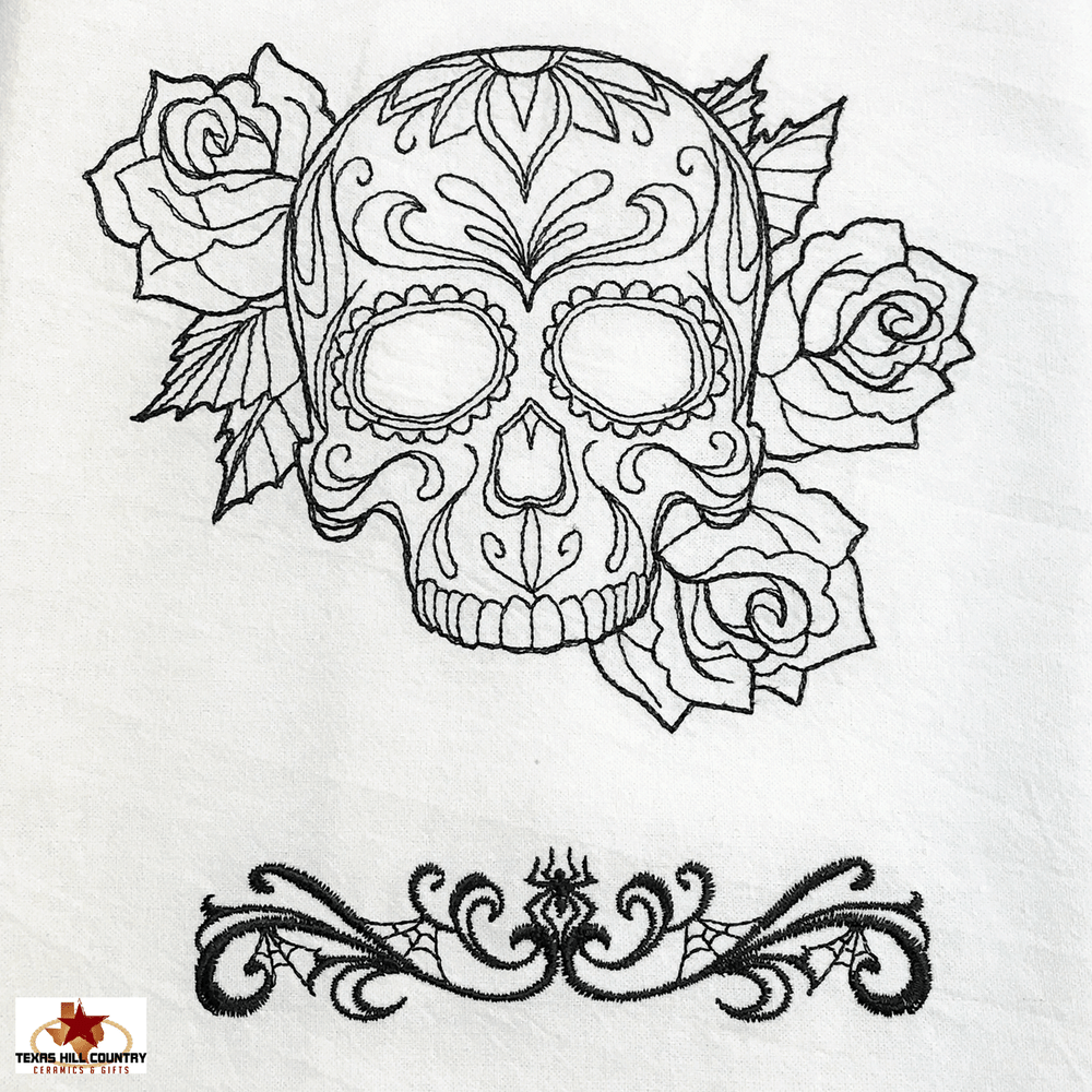 Tattoo skull embroidery design on cotton kitchen towel with spider web accent in black on white made in the usa