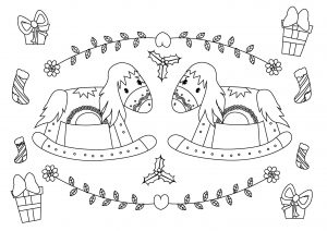 Two children ready to open their presents at the foot of the tree