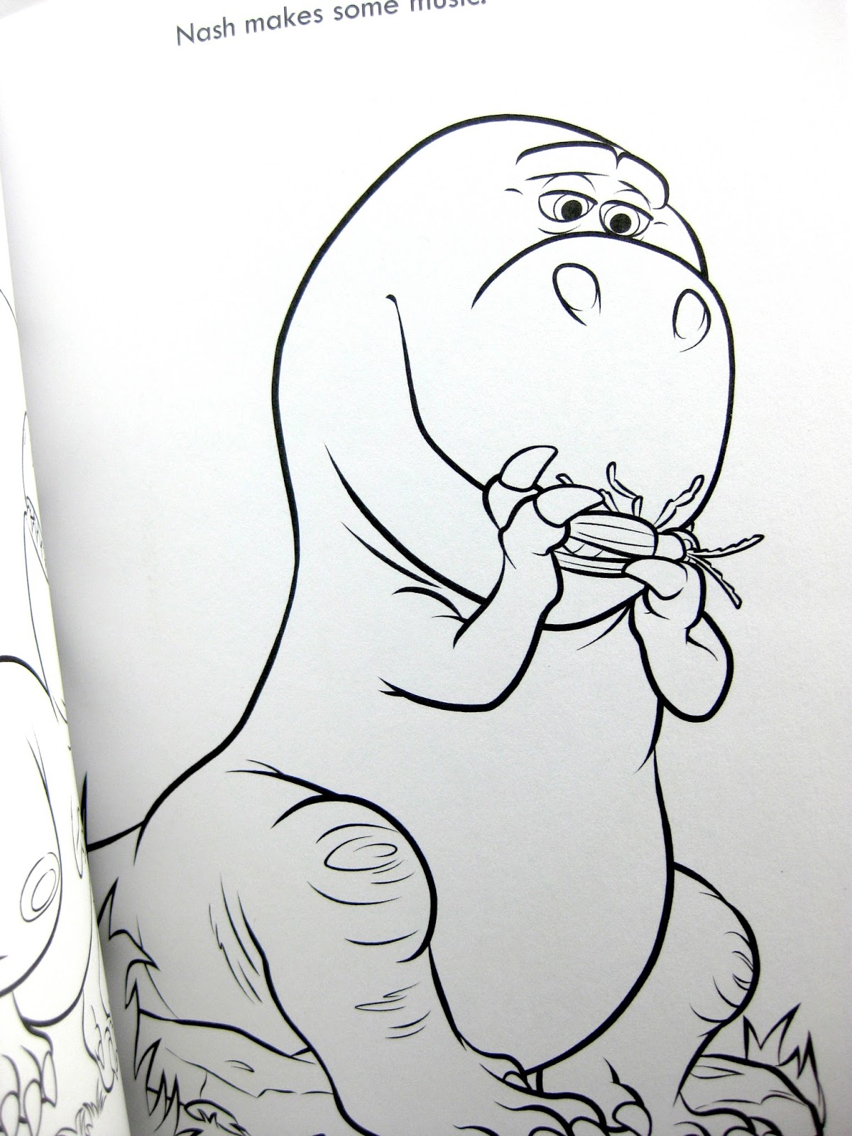 Dan the pixar fan the good dinosaur spot leads the way paint book