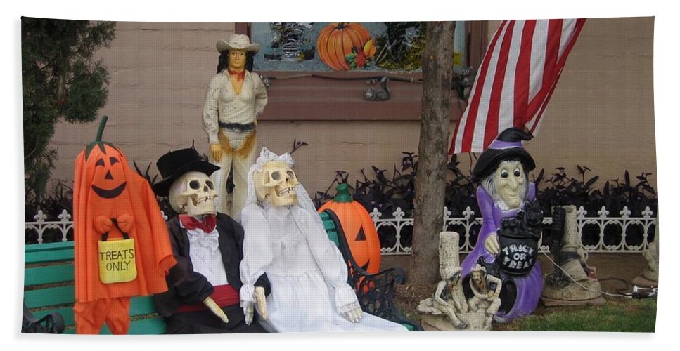 Front yard halloween display tombstone arizona beach towel by david lee guss