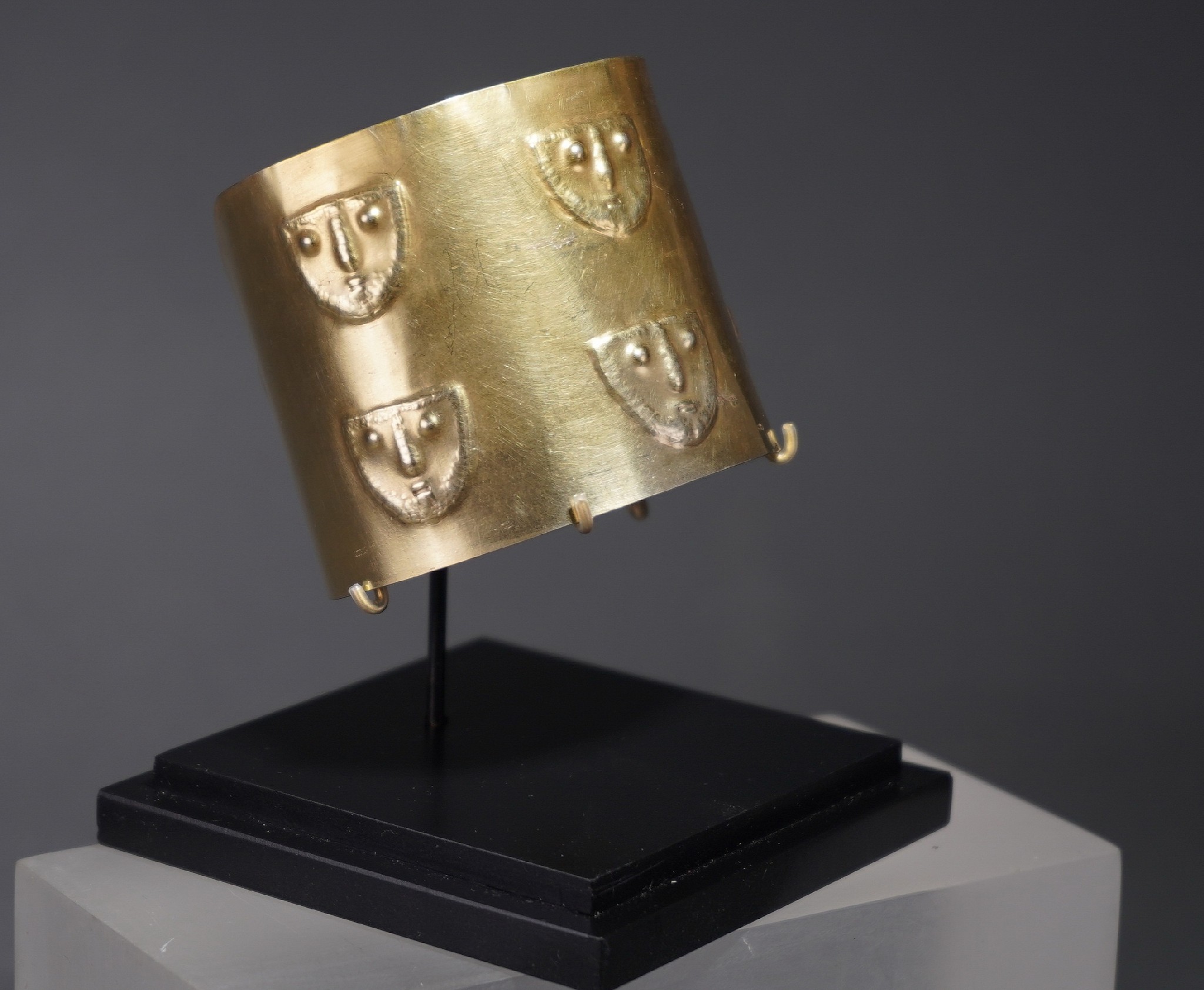 Peru late nasca gold cuff with embossed faces david bernstein pre