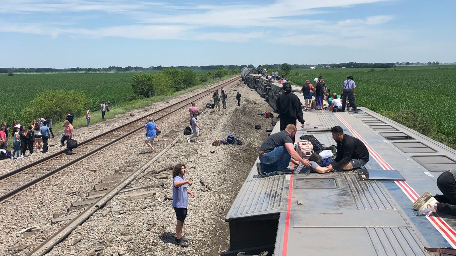 Three people killed as amtrak train derails after colliding with lorry in missouri us