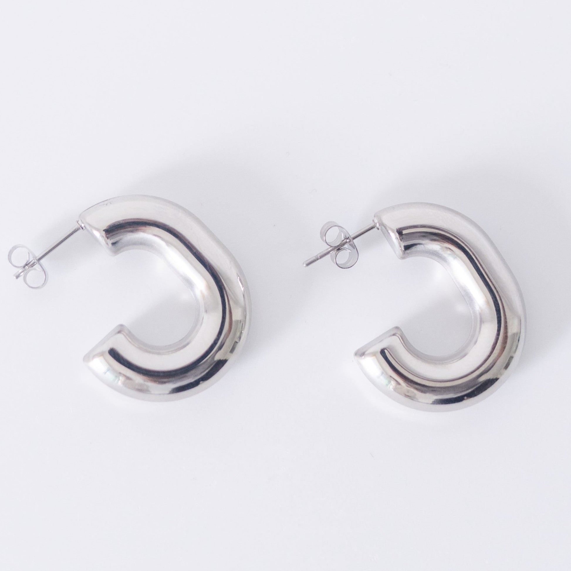 Mini ursula earrings â delta charms