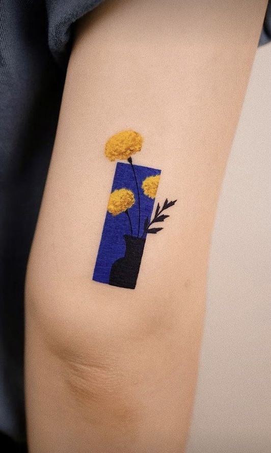 Is there a specific name for those kind of tattoos i want to get something similar likt this on the back of my upper arm with sunflower and a blue sky to