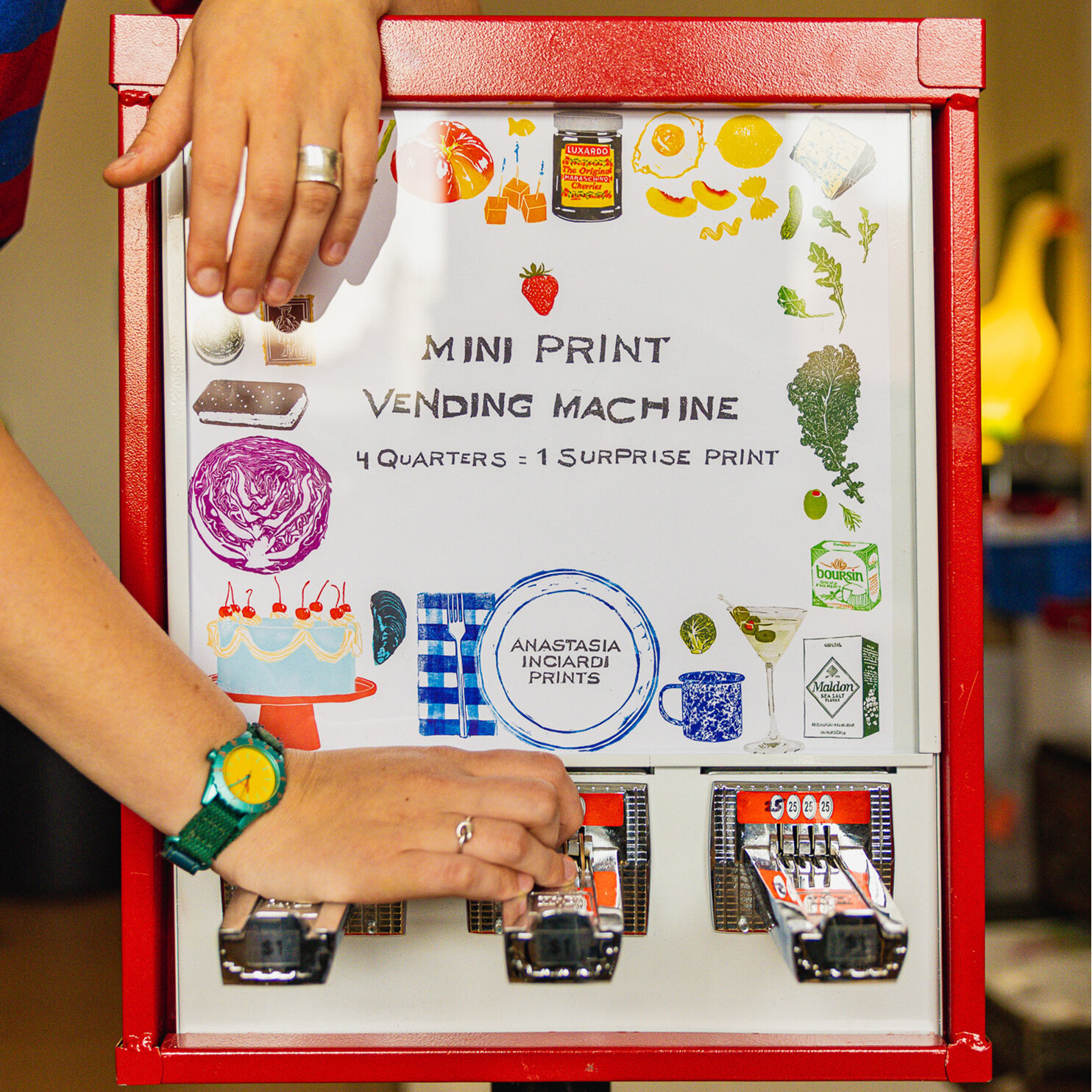 At this vending machine four quarters get you one surprise artwork