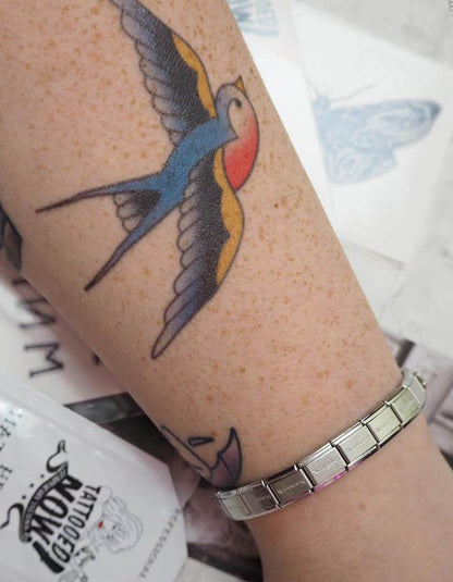 Traditional swallow temporary tattoo â tattooed now